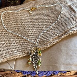 Elegant Gold and Silver Leaf Pendant Necklace